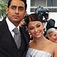 Aishwarya Rai Bachchan and actor Abhishek Bachchan pose on red carpet as they arrive at 62nd Cannes Film Festival